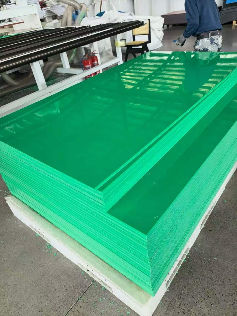 Green HDPE mats stacked